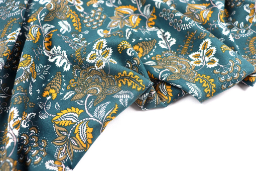 Geschmeidige Viskose mit modischem Design - ein Hingucker für luftige Bekleidung! Bk7759 Viskosestoff Tropisch Blau 2 Blusenstoffe Viskosestoff - Tropic PetrolViskosestoff mit tropischem Muster
