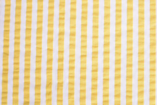 Seersucker Stoff aus 100 % Baumwolle mit klassischem Muster – luftig, leicht und ideal für Sommermode. Co6979 Seersucker Streifen Gelb Bettwäsche-Stoffe Seersucker - Streifen - GelbSeersucker mit gelben Streifen