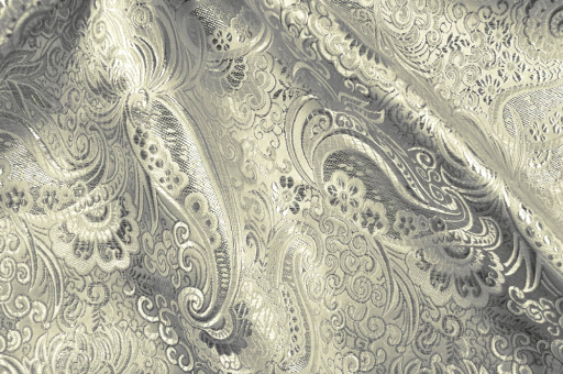 Glänzende Meterware in Champagner und Silber, deren edle Ornamente in Jacquard-Webart eingearbeitet wurden Fn1126150 Brokat Maharadscha Champagner Silber Glanzstoffe Brokat Maharadscha - Champagner/SilberBrokat mit orientalischem Motiv