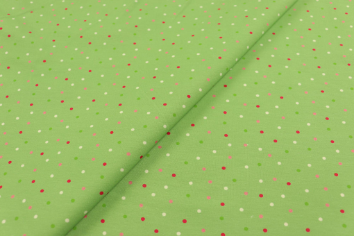 Zarter Baumwolljersey in Grünmit feinem Punktmuster – weich, elastisch und perfekt für stilvolle Basics. Sp165023 Jersey Greenconfetti S4y Kinder Jersey - Green ConfettiJersey Stoff mit grünem Punkte Muster