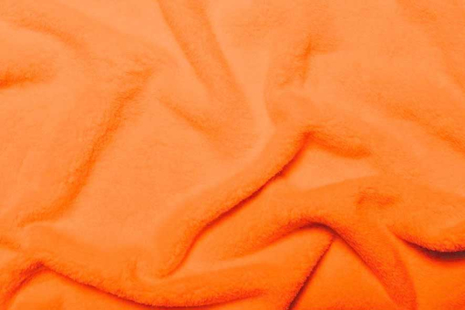Ein traumhaft kuschelig, weiches Flausch-Erlebnis erwartet Sie hier Wellness Fleece Orange Fleece Wellness Fleece OrangeSuperweicher Fleece-Stoff in tollen Farben