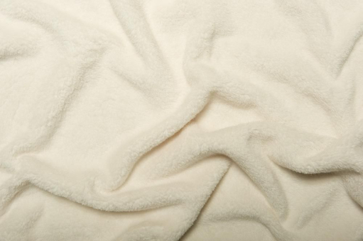 Ein traumhaft kuschelig, weiches Flausch-Erlebnis erwartet Sie hier Wellness Fleece Stoff Creme Z1 Fleece Wellness Fleece CremeSuperweicher Fleece-Stoff in tollen Farben