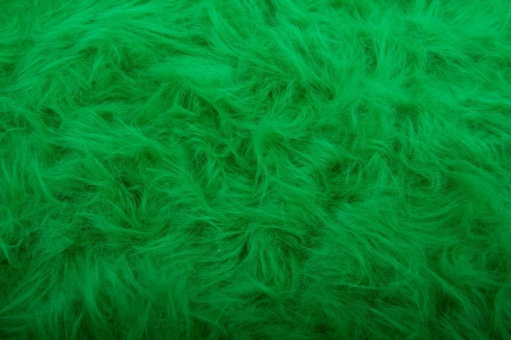 Zotteliges Kunstfell mit ca. 4,5 cm hohem Flor in kräftigem Grün Zottelfell Gruen Z1 Gras / Schnee Flokati Grün