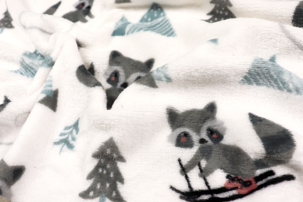 Kuschelfleece - Waschbär im Winter 