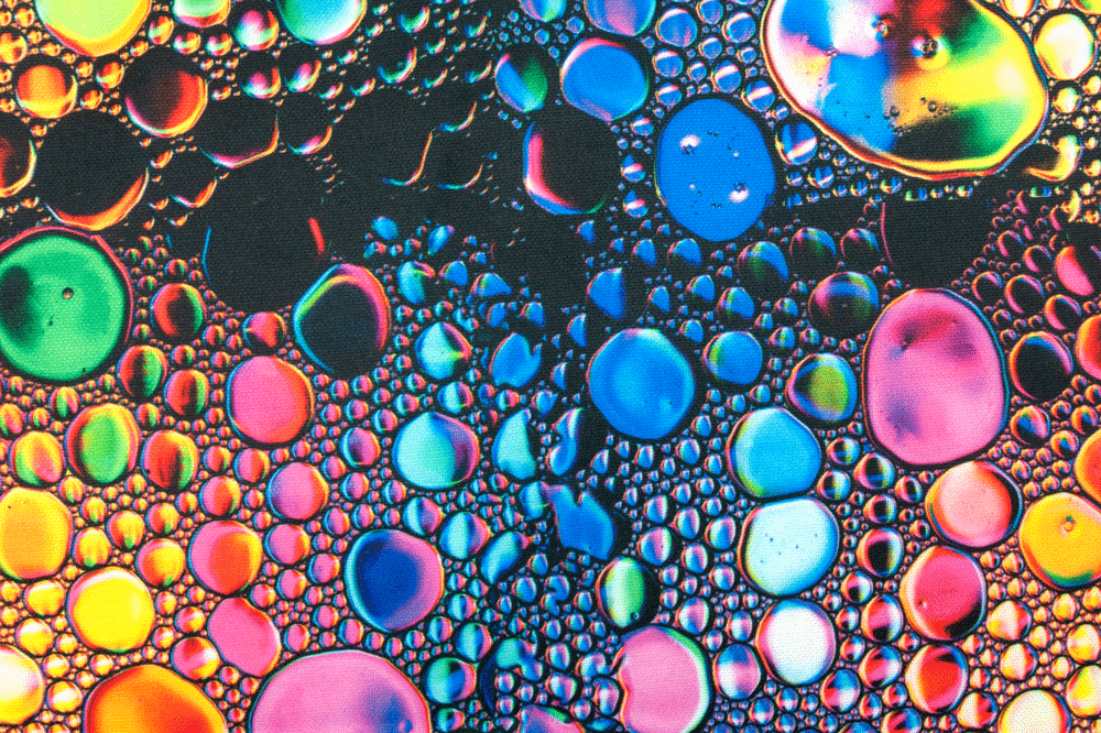 Pflegeleichter, elastischer Stoff mit kunterbuntem Blasen-Motiv - für alle, die Bewegungsfreiheit lieben Bk6348 Sport Stretch Rainbow Bubble S4 Elastikstoffe Sport Stretch - Rainbow Bubble