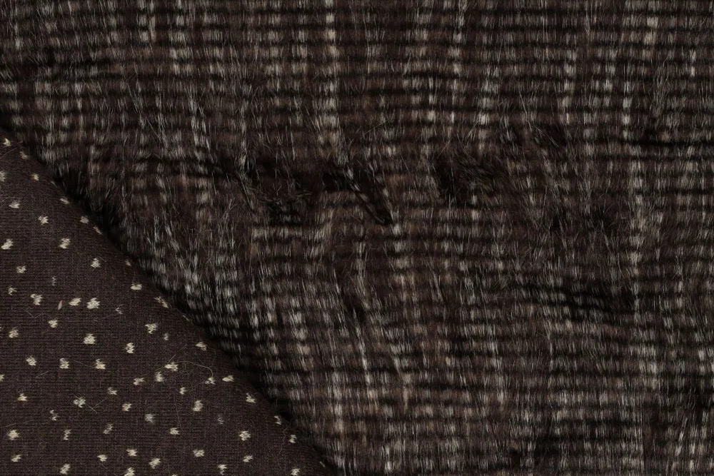 Wild, weich und außergewöhnlich: Dieses dunkle Pelzimitat erinnert an feines Federkleid. Fp1154 Fell Bird Pelzimitat Pelzimitat - Bird