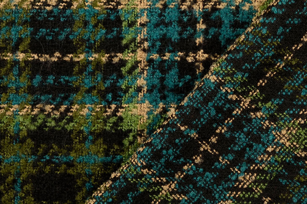 Markanter Woll-Mix im modernen Karo – ideal für stilvolle Mäntel, Jacken oder Accessoires mit Statement. Wo1046440 Tweedstoff Grn 1 Karostoffe Tweed-Stoff - Wolly Karo - Grün