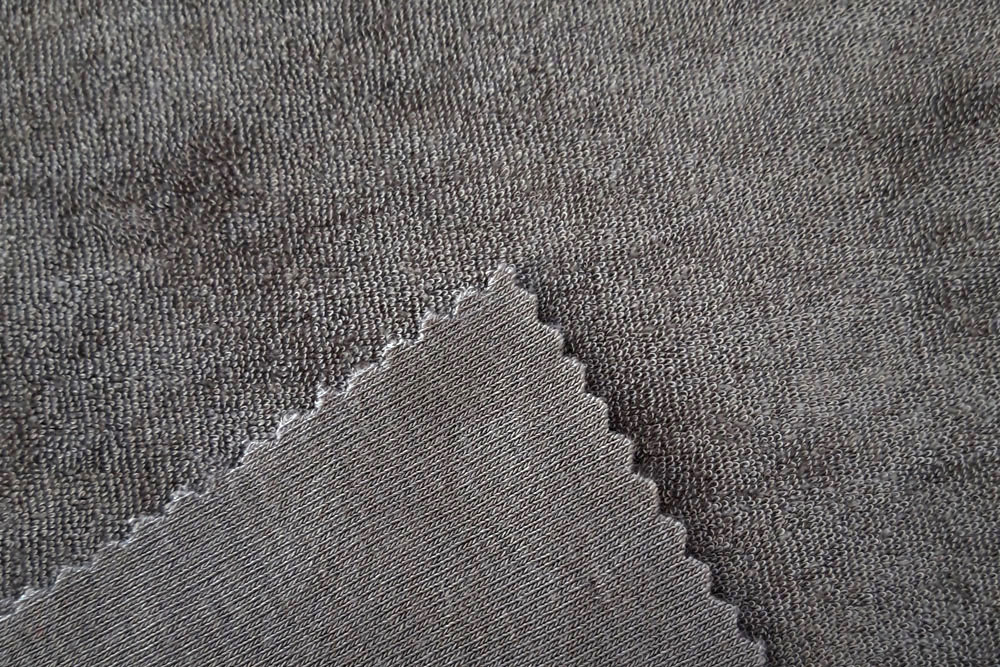 Hochwertiger Frottee-Fleece, sehr elastisch, ideal für bequeme Freizeitbekleidung und mehr  Bk6452377 Bambus Frottee Strech Stone S4y Drap(1) Uni Bambus-Frottee - Stretch - Stone