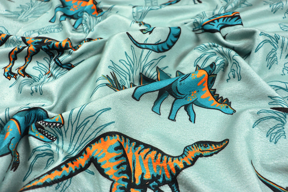 Bunte Dinosaurier auf leicht frottiertem Stoff – perfekt für kreative Strandtücher und sommerliche Accessoires! Bk7826 Strandtuchstoff Dinosaurier S4 Frottee Stoff Strandtuch Stoff - Jurassic Dinos