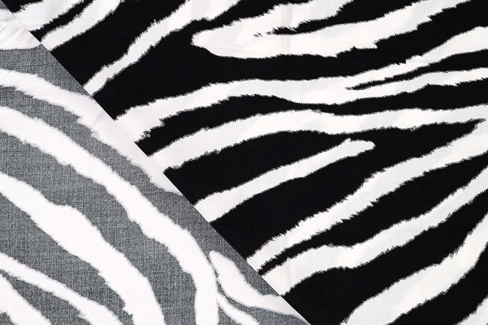 Geschmeidige Popeline aus reiner Viskose mit schwarz-weißem Print - modisch, zeitlos, elegant! Bk7940 Viskosestoff Zebra bedr. Bekl. Stoffe Viskosestoff - Zebra
