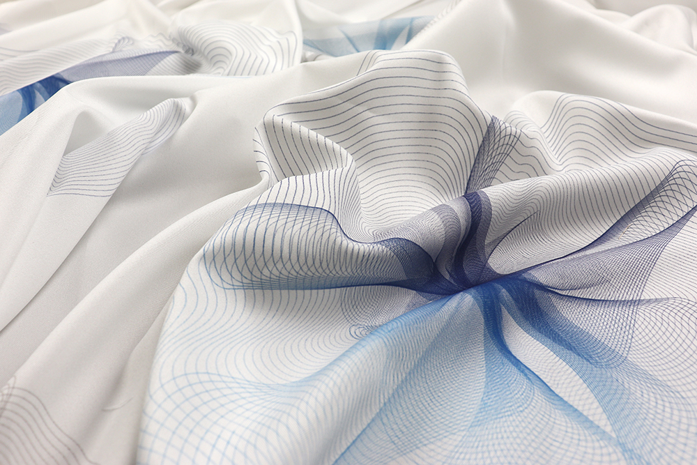 Stoff mit Stil aus der JOOP!-Kollektion - lassen Sie Ihr Zuhause in neuem Glanz erstrahlen! Sp152007 Gardinenstoff Abstralt Blau  Logo Dekostoffe sonstige JOOP! - Gardinenstoff Blue Breeze