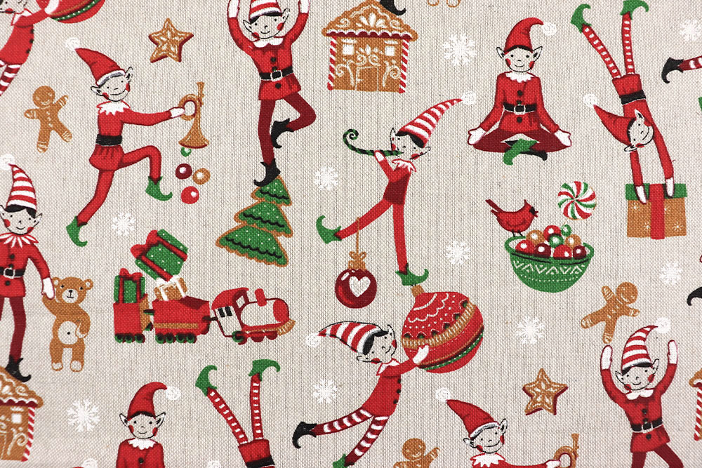 Ein Stoff wie aus der Weihnachtswerkstatt: Wichtel, bunte Spielzeuge und jede Menge gute Laune – auf natürlichem Leinenlook! Wn534 Dekostoffleinenoptik Elfentanz S4y Weihnachten Figuren Dekostoff Leinenoptik - Elfentanz